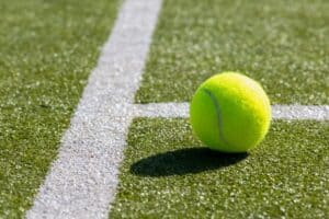 Tennis ball on an artificial turf court