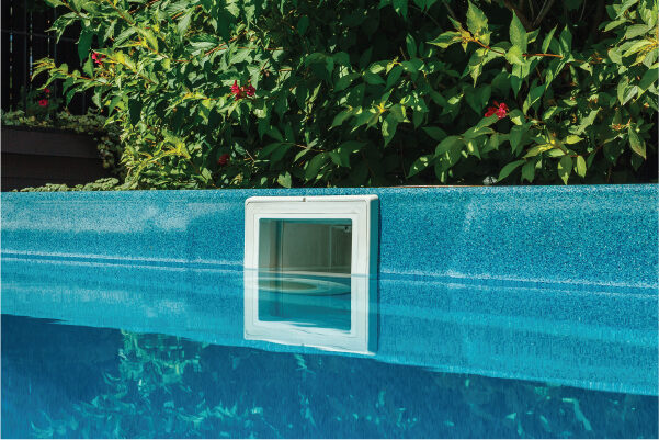 Skimmer pool by Pools & Courts residential pool company